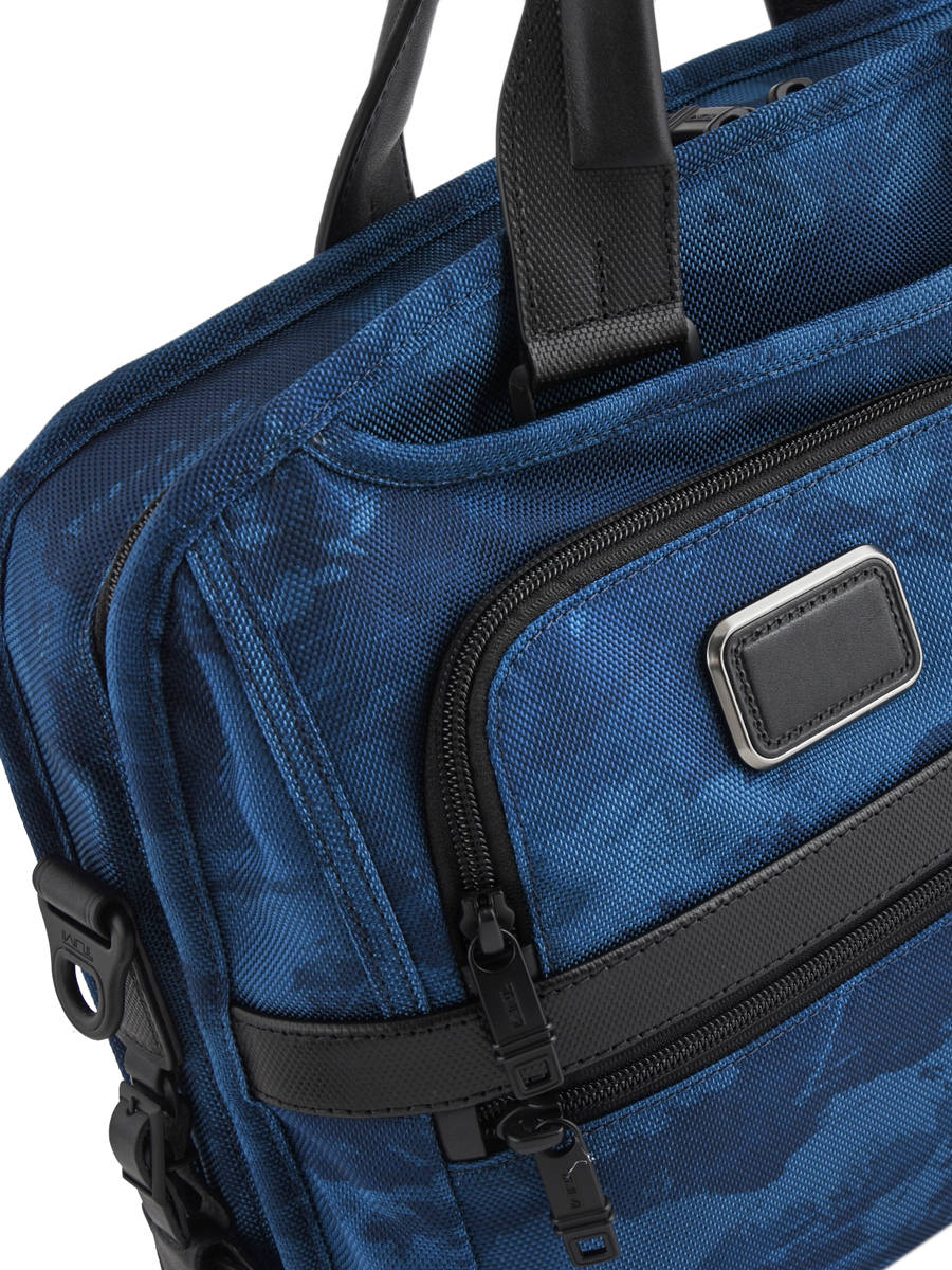 tumi blue luggage